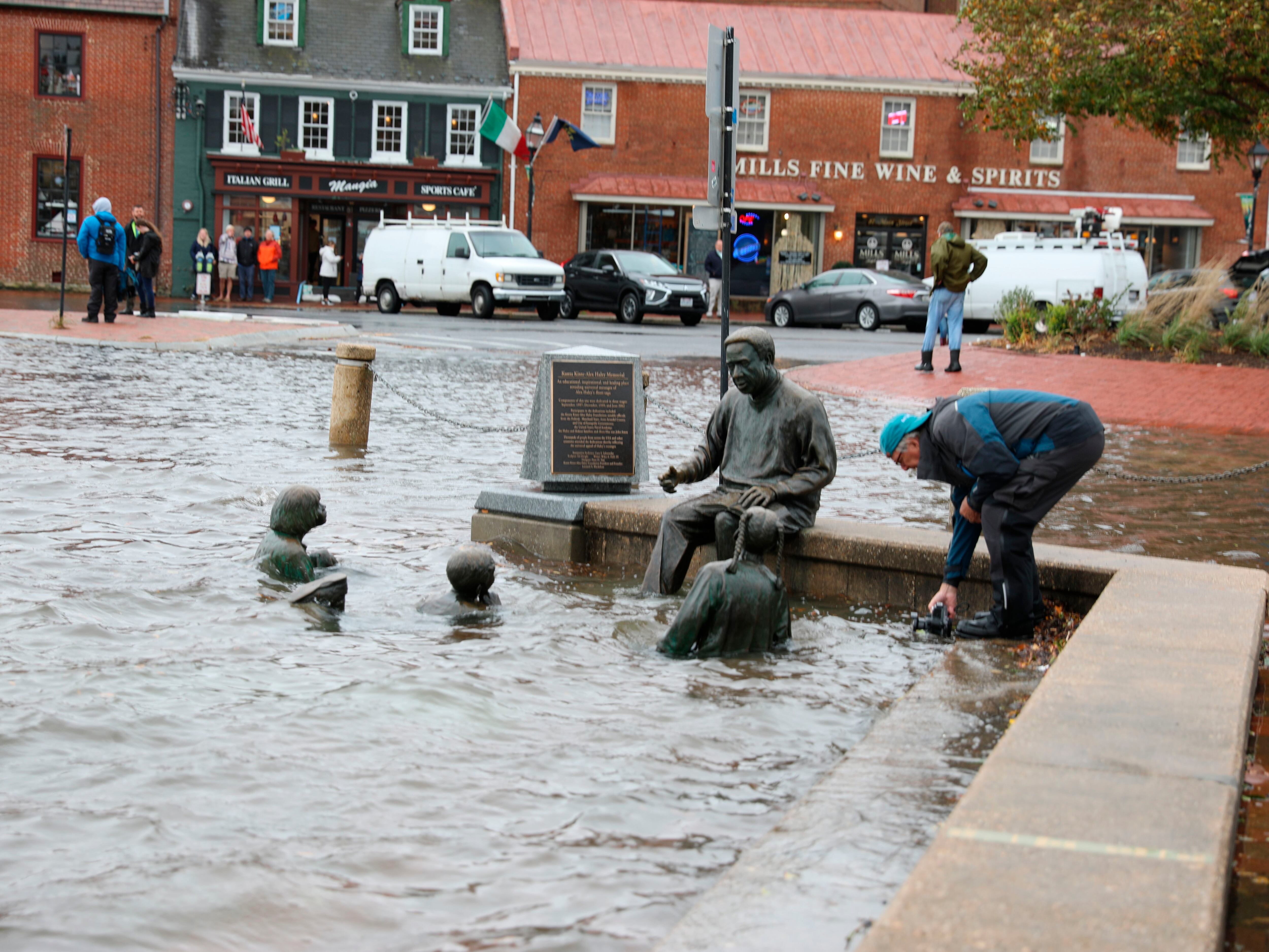 High tide flooding in downtown Annapolis, Md., in 2021. The number of days with high tide flooding is accelerating on the East and Gulf coasts.