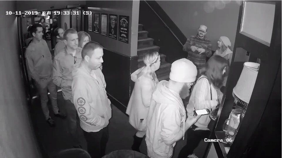 Security camera footage shows Christopher Knipe (center) in line at the Bossanova Ballroom on, October 11, 2019, the night Sean Kealiher was killed in Northeast Portland. 