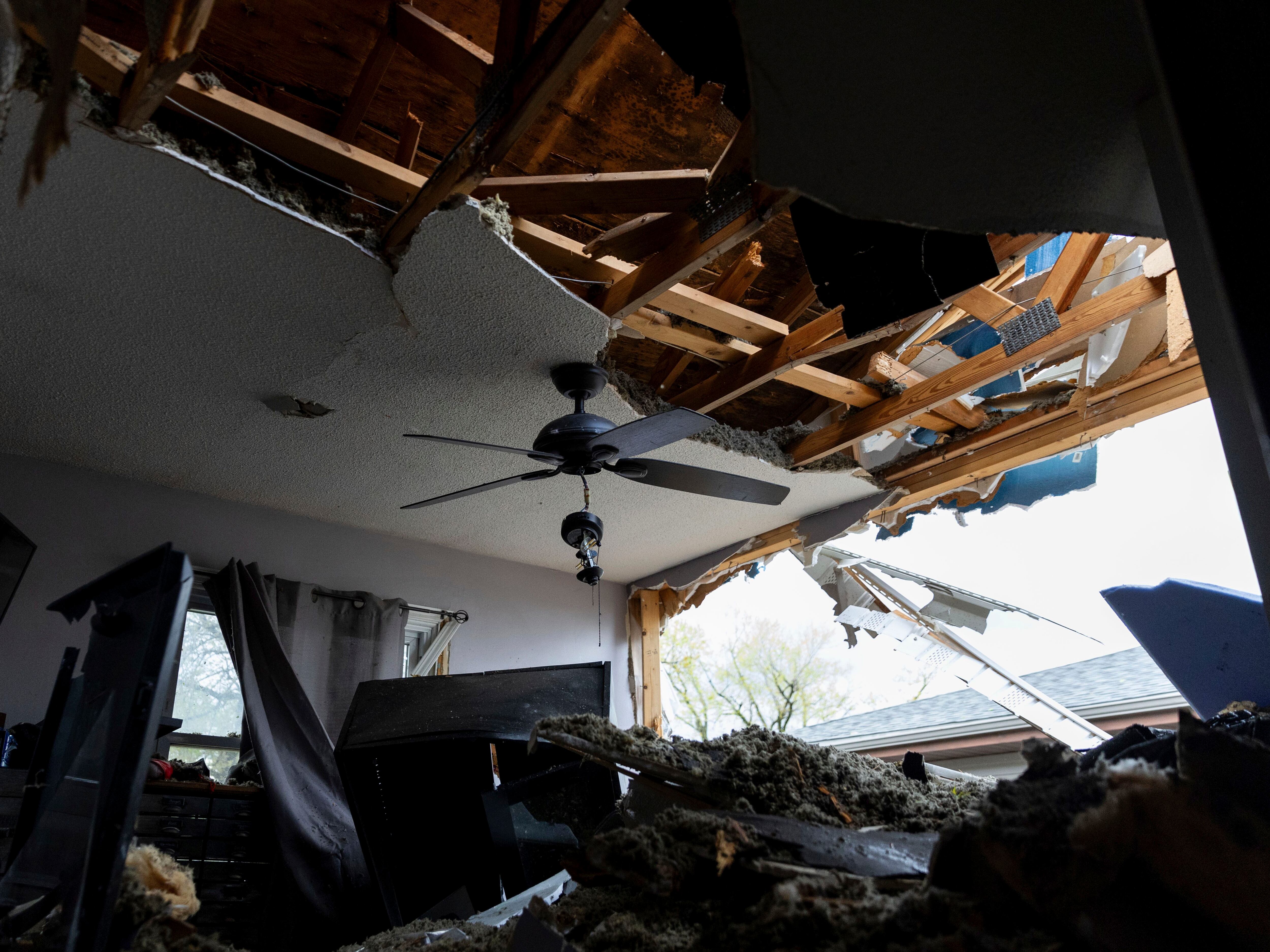 Damage is seen to Justin and Amanda Putnam's bedroom after a severe storm damaged their neighborhood in Council Bluffs, Iowa, on Friday, April 26, 2024.