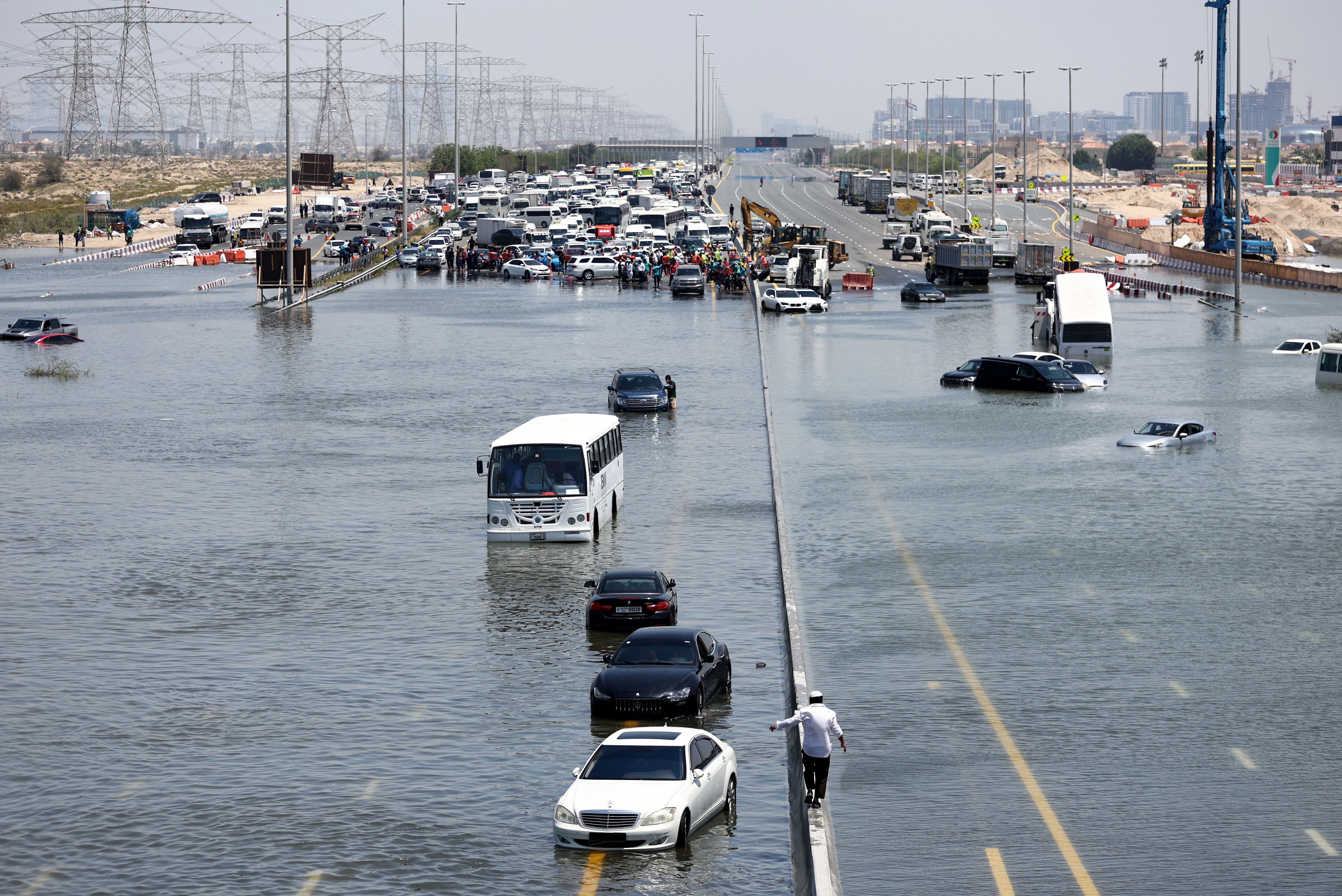 Atypically heavy rains in the United Arab Emirates on Monday and Tuesday caused flooding, flight cancellations and school closures. Vehicles were abandoned on highways like this one in Dubai.
