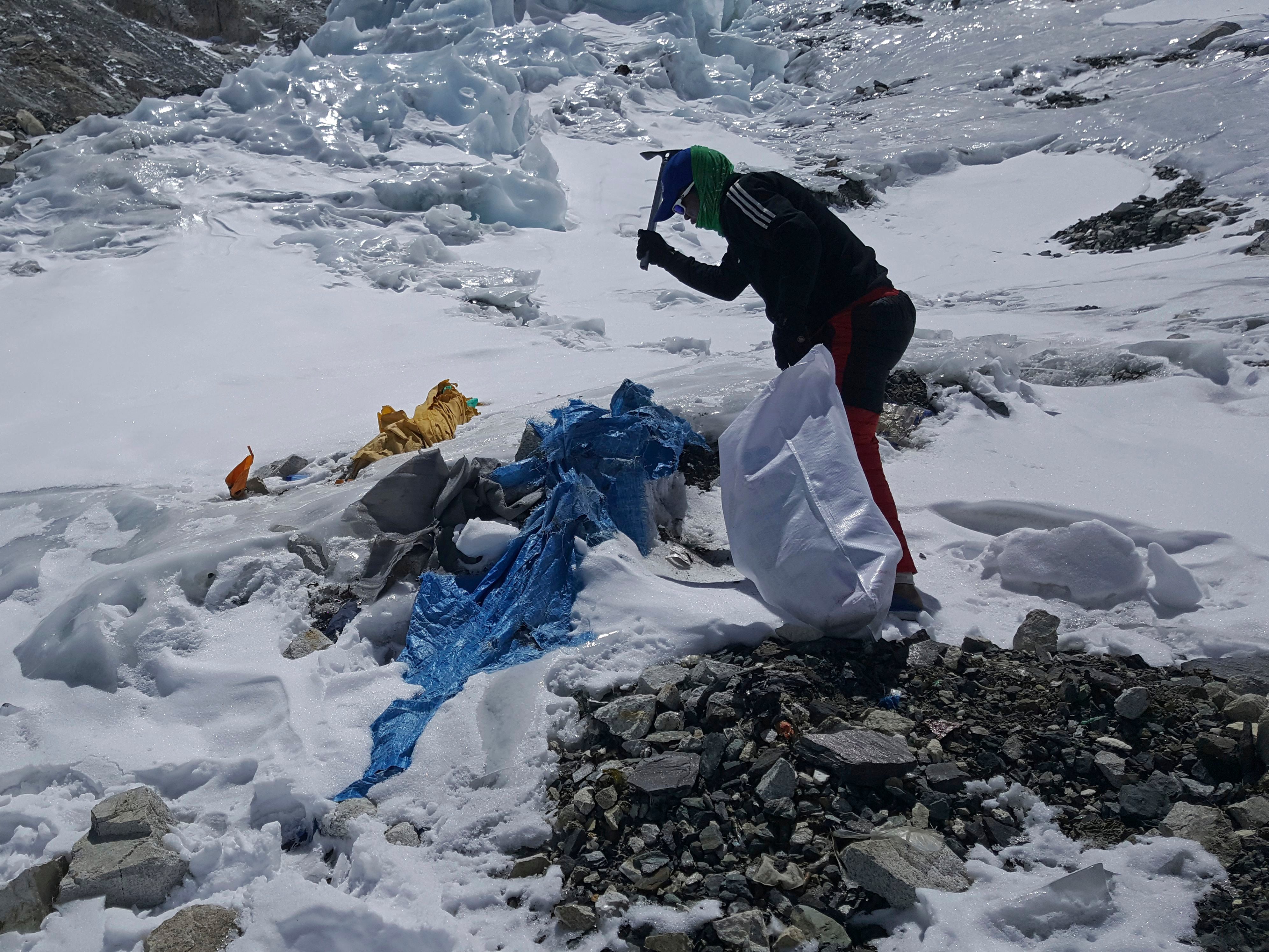 Everest's highest camp is littered with frozen garbage. The